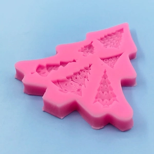 Pink silicone Christmas tree mold with five cavities for DIY cakes and chocolates