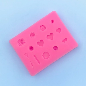 Moule en silicone rose avec 12 cavités en forme de rose cœur et étoile pour pâtisserie