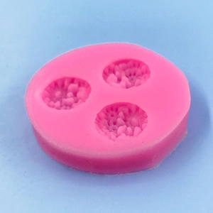 Pink silicone mold with three daisy patterns for cake fondant and candle making DIY