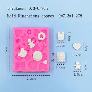 Pink silicone cartoon cookie mold for resin and clay featuring heart and star shapes