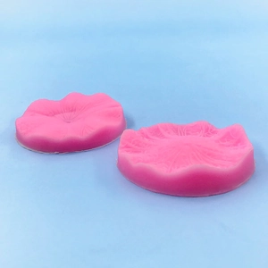 Detailed food-grade pink silicone molds showing realistic petal textures for cake decorating
