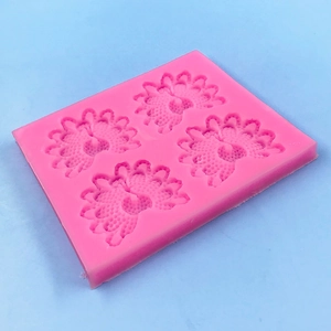 Pink peacock silicone mold with four cavities for DIY baking and resin crafting