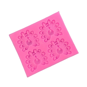 Pink silicone mold with four peacock patterns for baking and DIY crafts