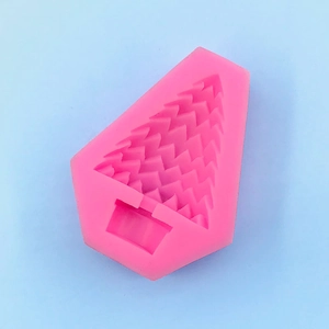 Detailed top view of a pink Christmas tree silicone mold for DIY baking and crafts