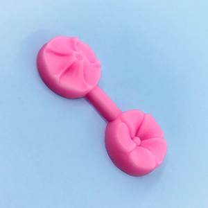 Pink silicone flower mold for fondant sugar petals and floral cake decorating tools