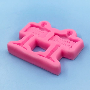 Pink silicone mold for Christmas street signs with Merry Christmas festive lettering