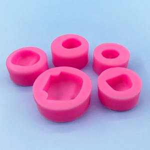 Five pieces of pink silicone molds for handmade soap and face shaped fondant craft tools