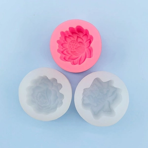 Detailed macro view of pink and white lotus and peony silicone floral cake molds