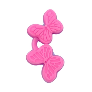 Pink butterfly silicone mold with detailed wing texture for DIY cake baking and crafts