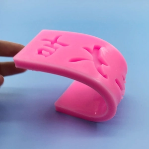 Pink silicone mold with auspicious Chinese characters showing high flexibility and durability