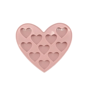 Herzförmige Silikonform in Rosa mit 10 Mulden für Schokolade und Backdekorationen