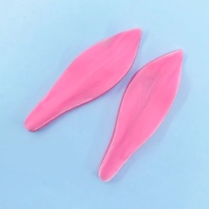 Detail view of pink silicone leaf vein press mold for lily flower fondant decoration