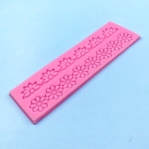 Pink silicone fondant mold with daisy flower border design for DIY cake decorating