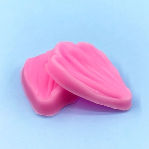 Pink silicone leaf petal vein mold for fondant baking with detailed radial texture