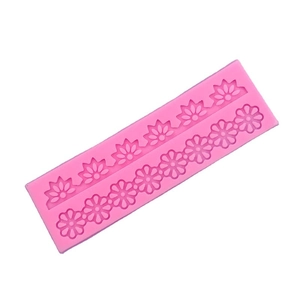 Pink silicone fondant mold featuring intricate floral lace border patterns for cake DIY