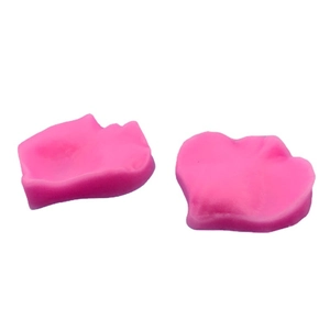 Rose pink silicone lip and nose practice molds for permanent makeup training on white background