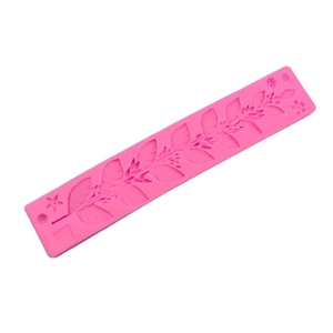 Pink silicone mold with leaf and flower vine patterns for DIY fondant cake decorating