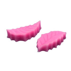 Pink leaf-shaped silicone fondant mold with realistic leaf texture for cake decorating