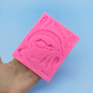Roze siliconen vorm met veer- en engelenvleugelpatronen voor doe-het-zelf decoratie