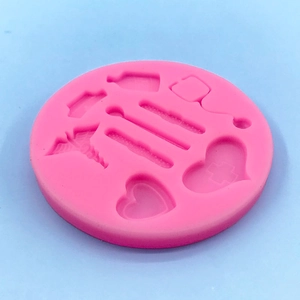Moule en silicone rose avec motifs médicaux et stéthoscopes pour créations DIY