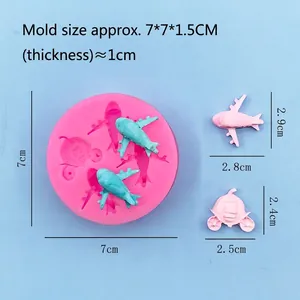 Pink silicone mold with plane and pumpkin carriage shapes for DIY fondant and chocolate