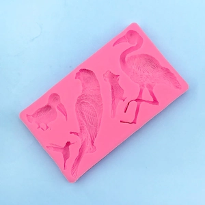 Detailed pink silicone mold for flamingo and parrot shaped fondant or chocolate cake decor