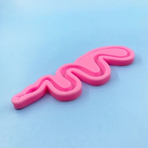 Pink S-shaped snake silicone mold with scale texture for DIY baking and resin crafts