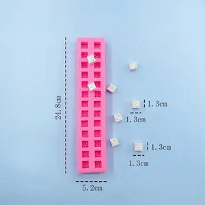 Pink silicone mold for 26 capital block letters used for chocolate fondant cake decorating