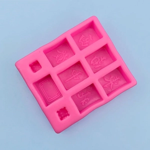 Moule détaillé en silicone rose avec caractères mahjong chinois pour la pâtisserie