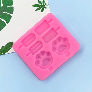 Moule en silicone rose à quatre cavités en forme de patte de chat et glace pour pâtisserie DIY