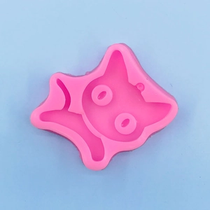 Detailed view of pink silicone cartoon cat mold for DIY resin, soap and cake decorating