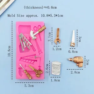Pink silicone mold for hardware tools including ladder, hammer, and saw for DIY fondant