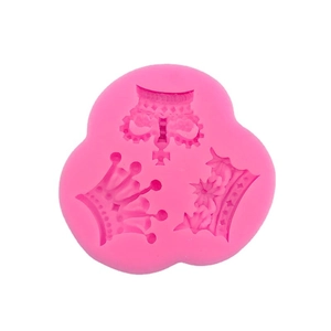 Rose red silicone mold featuring three distinct princess crown designs for cake decorating