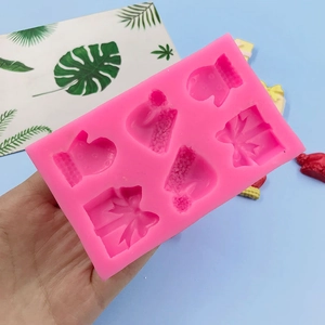 Pink 6-cavity silicone mold featuring Christmas gloves, hats and gift boxes for DIY baking