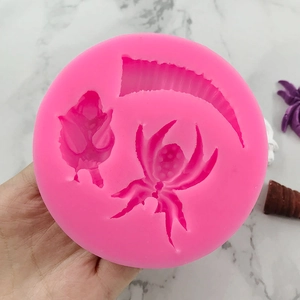 Pink Halloween silicone mold with spider and scythe shapes for chocolate cake decorating
