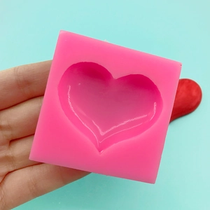 Pink heart-shaped silicone mold for DIY soap making and chocolate fondant decorations