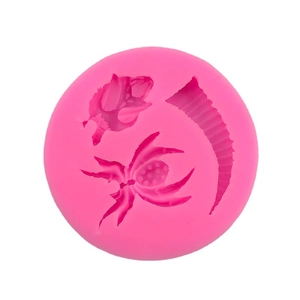 Pink silicone mold with spider and horn shapes for Halloween DIY cake decorating
