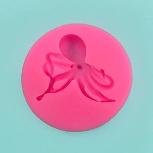 Detailed view of octopus shaped pink silicone mold for cake fondant and chocolate making