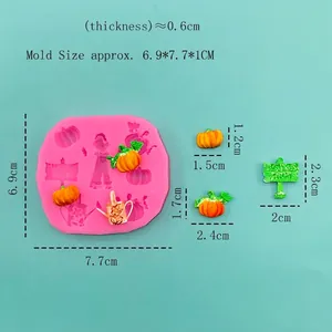 Pink silicone mold with pumpkin patch and watering can shapes for DIY baking decor