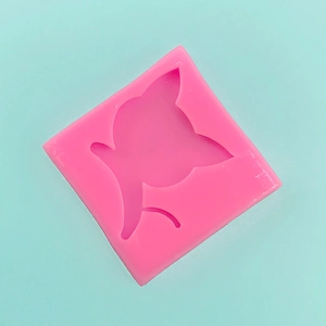 Detailed top view of pink silicone cat head mold for chocolate or fondant DIY crafts