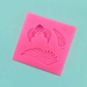 Detailed pink silicone mold featuring angel heart wings and feathers for DIY crafts