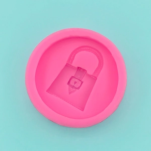 Détail du moule à main rose en silicone avec textures de poignée pour décorer gâteaux