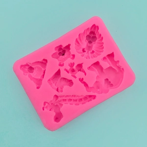 Detailed pink silicone mold featuring gothic animal skulls and monster shapes for DIY crafts