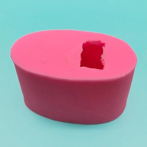 Detailed view of pink silicone bear mold for DIY soap and candle making crafts