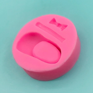 Moule en silicone rose nœud de chaussure de bébé pour fondant et chocolat artisanal