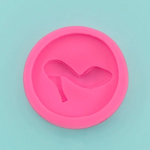 Detailed top view of pink silicone mold with 3D high heel shoe shape for cake decor