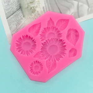 Macro view of pink silicone mold featuring intricate sunflower and leaf patterns