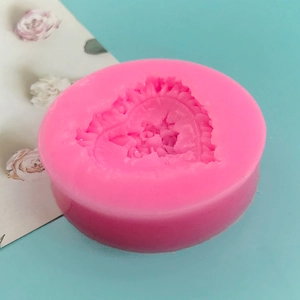 Pink heart-shaped rose silicone mold for chocolate mousse, cake decor, and aromatherapy