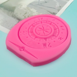 Pink silicone mold featuring punk gear compass design for fondant and DIY resin crafts