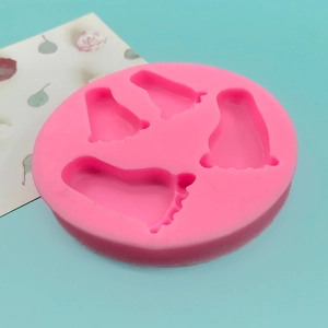 Moule en silicone rose avec formes de pieds de bébé pour gâteaux DIY et chocolat